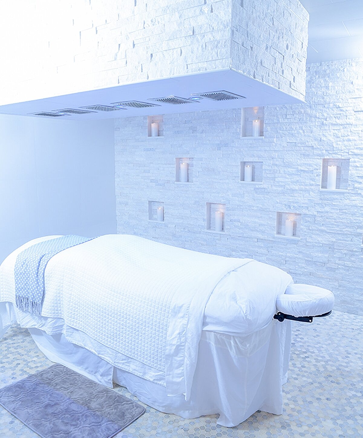 Smiling woman with long, light brown hair.