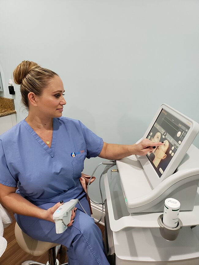 Vero Beach Med Spa specialist operating Ultherapy machine