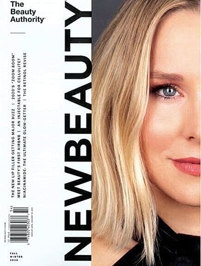 Magazine cover featuring a woman with blonde hair.